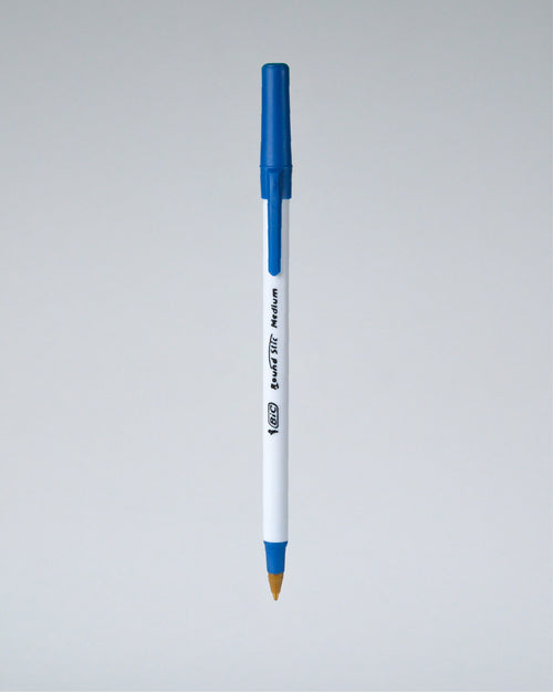 A blue and white Perfora ballpoint pen with a gold tip, shown vertically against a neutral gray gradient background.