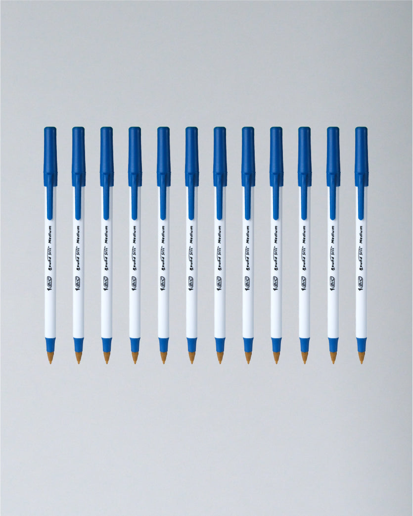 A set of ten blue and white pens arranged in a neat horizontal row on a light gray background.
