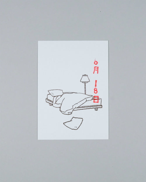 A minimalist art print featuring a black line drawing of a bed with a lamp and a broken piece of paper, with the date '6月18日' written in red on the right, displayed on a neutral gray background.