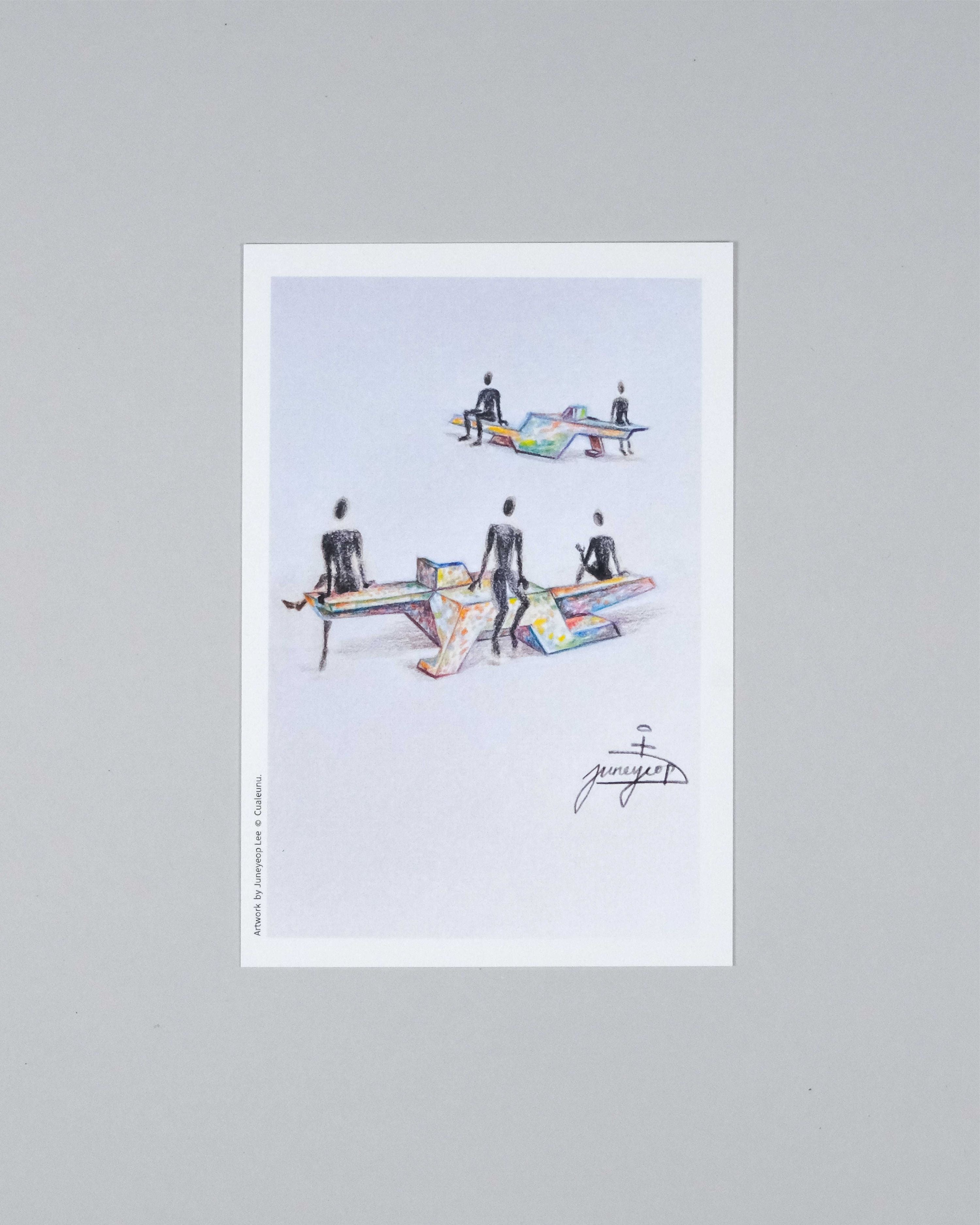 A framed art print featuring a minimalist illustration of several figures standing around colorful, geometric tables on a light background, displayed against a neutral gray wall.