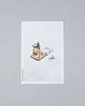 A minimalist art print featuring an isometric illustration of a person riding a bicycle on a skateboard, printed on a white sheet of paper and displayed against a neutral gray background.